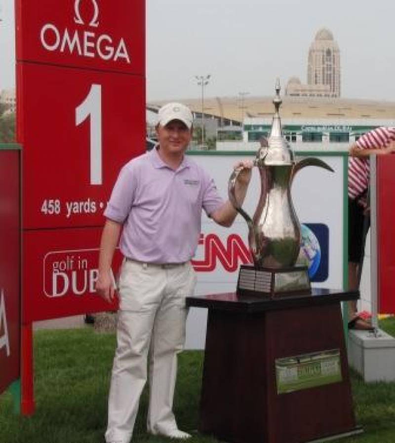 Phil Kenyon with the Dubai Desert Classic Trophy