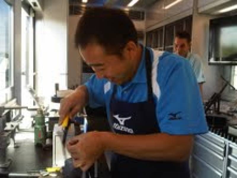 Rick the Mizuno technician at work in the Tour Van
