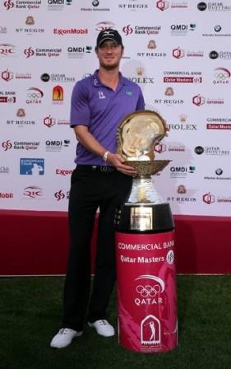 Chris Wood with the Qatar Masters Trophy