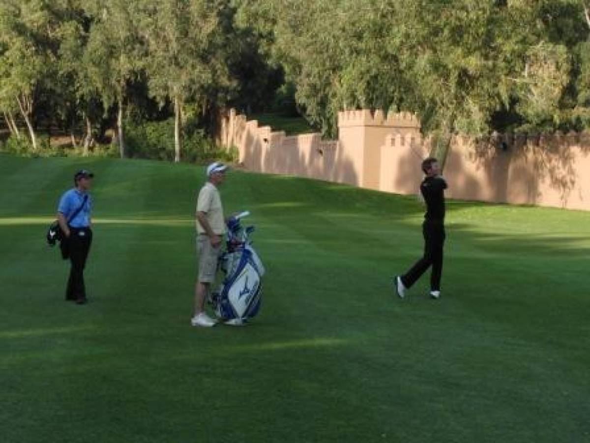 Chris Wood watches his approach into the 9th hole in practice on the Golf Du Palais