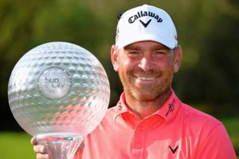 Thomas Bjorn with the  Nedbank Golf Challenge Trophy